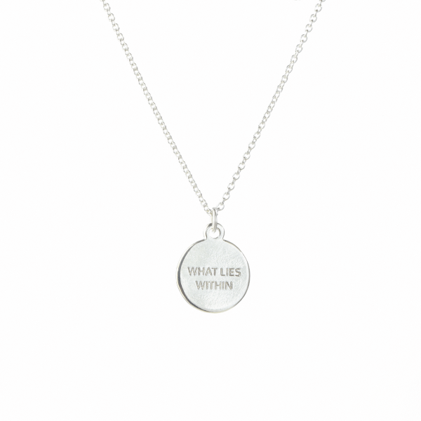 Up close picture of inspirational silver women's necklace
